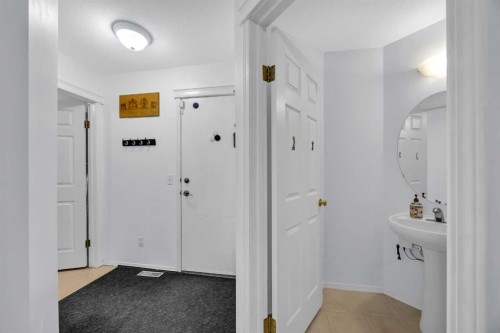 60 Tuscarora Way Nw, Calgary, AB - Indoor Photo Showing Other Room