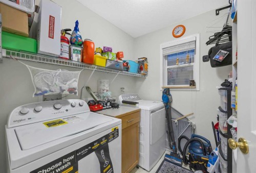 60 Tuscarora Way Nw, Calgary, AB - Indoor Photo Showing Laundry Room