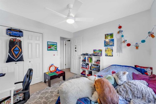 60 Tuscarora Way Nw, Calgary, AB - Indoor Photo Showing Bedroom