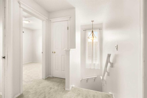 13 Coville Gardens Ne, Calgary, AB - Indoor Photo Showing Other Room