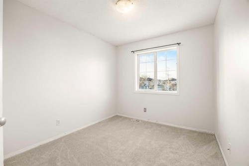 13 Coville Gardens Ne, Calgary, AB - Indoor Photo Showing Other Room