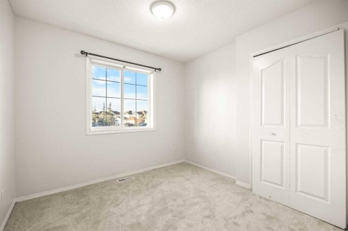 13 Coville Gardens Ne, Calgary, AB - Indoor Photo Showing Other Room