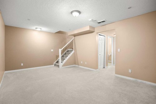 13 Coville Gardens Ne, Calgary, AB - Indoor Photo Showing Other Room