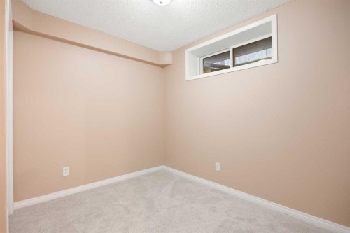 13 Coville Gardens Ne, Calgary, AB - Indoor Photo Showing Other Room