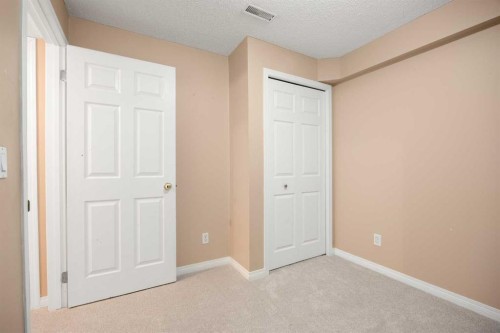 13 Coville Gardens Ne, Calgary, AB - Indoor Photo Showing Other Room