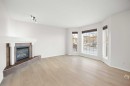 13 Coville Gardens Ne, Calgary, AB  - Indoor Photo Showing Living Room With Fireplace 
