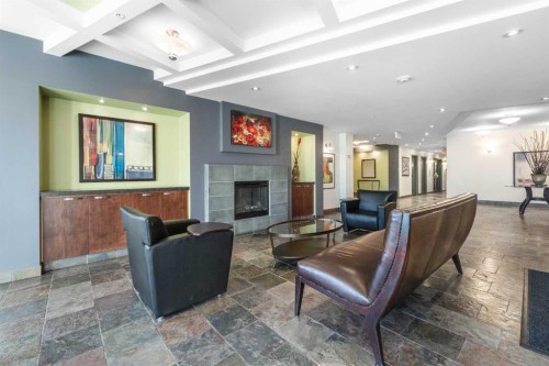 2305-5605 Henwood Street Sw, Calgary, AB - Indoor With Fireplace