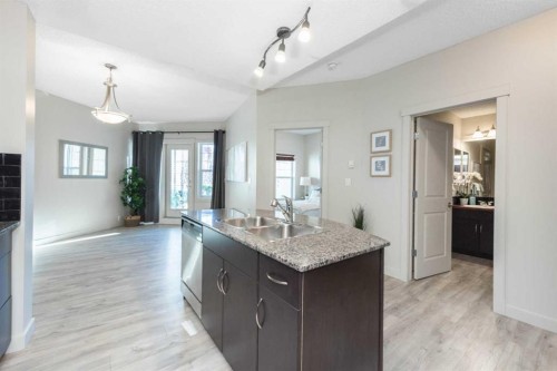 2305-5605 Henwood Street Sw, Calgary, AB - Indoor Photo Showing Kitchen With Double Sink