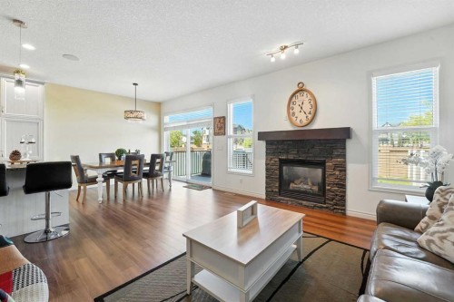 57 Evansglen Mews Nw, Calgary, AB - Indoor Photo Showing Living Room With Fireplace