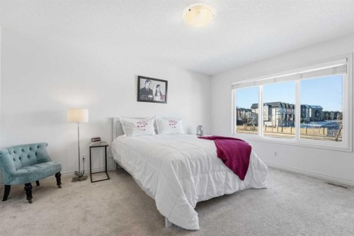 57 Evansglen Mews Nw, Calgary, AB - Indoor Photo Showing Bedroom