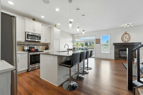57 Evansglen Mews Nw, Calgary, AB - Indoor Photo Showing Kitchen With Stainless Steel Kitchen With Upgraded Kitchen