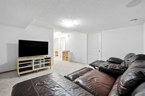 57 Evansglen Mews Nw, Calgary, AB - Indoor Photo Showing Living Room