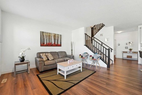 57 Evansglen Mews Nw, Calgary, AB - Indoor Photo Showing Living Room