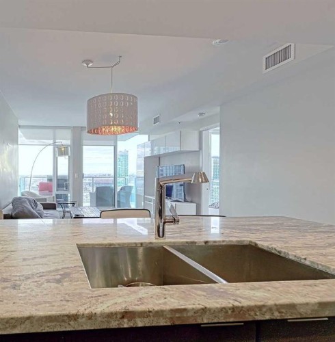 1903-519 Riverfront Avenue Se, Calgary, AB - Indoor Photo Showing Kitchen With Double Sink