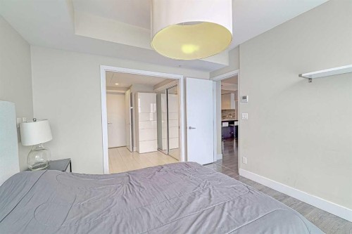 1903-519 Riverfront Avenue Se, Calgary, AB - Indoor Photo Showing Bedroom