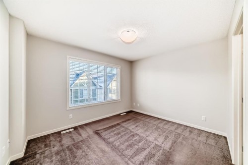 409 Nolanlake Villas Nw, Calgary, AB - Indoor Photo Showing Other Room