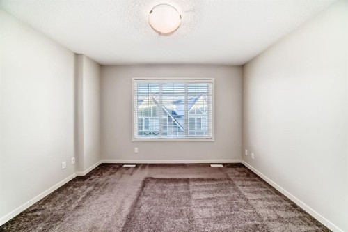 409 Nolanlake Villas Nw, Calgary, AB - Indoor Photo Showing Other Room