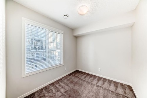 409 Nolanlake Villas Nw, Calgary, AB - Indoor Photo Showing Other Room