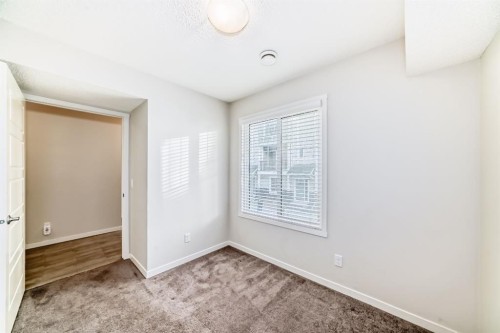 409 Nolanlake Villas Nw, Calgary, AB - Indoor Photo Showing Other Room