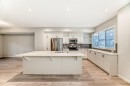 409 Nolanlake Villas Nw, Calgary, AB  - Indoor Photo Showing Kitchen With Stainless Steel Kitchen With Double Sink With Upgraded Kitchen 