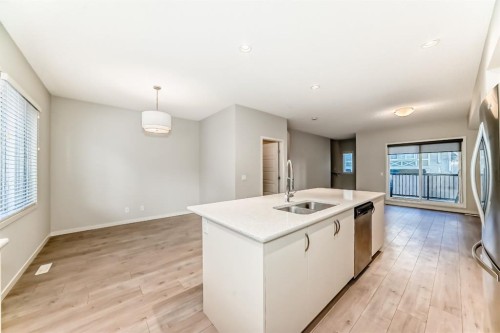 409 Nolanlake Villas Nw, Calgary, AB - Indoor Photo Showing Kitchen With Double Sink