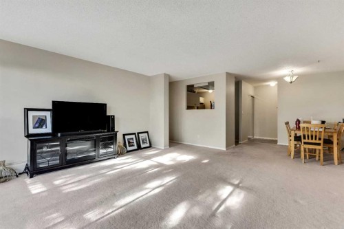 34B-231 Heritage Drive Se, Calgary, AB - Indoor Photo Showing Living Room