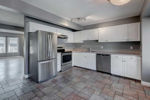 378 Regal Park Ne, Calgary, AB - Indoor Photo Showing Kitchen With Double Sink