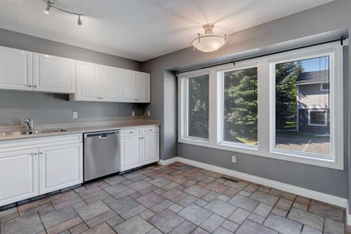 378 Regal Park Ne, Calgary, AB - Indoor Photo Showing Kitchen With Double Sink