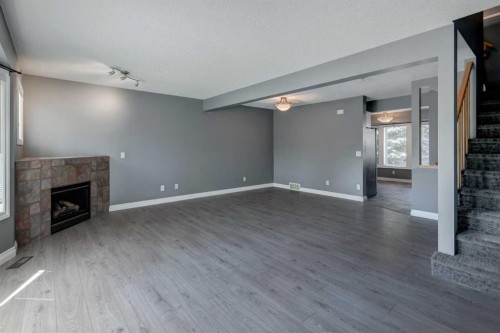 378 Regal Park Ne, Calgary, AB - Indoor With Fireplace