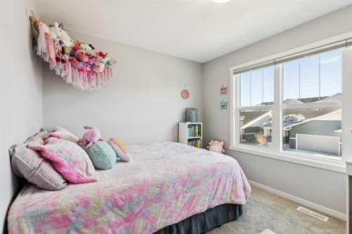 57 Crestridge Bay Sw, Calgary, AB - Indoor Photo Showing Bedroom