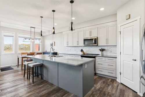 57 Crestridge Bay Sw, Calgary, AB - Indoor Photo Showing Kitchen With Upgraded Kitchen