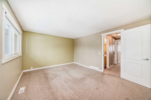 28-800 Bowcroft Place, Cochrane, AB - Indoor Photo Showing Other Room