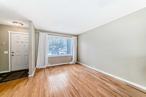 28-800 Bowcroft Place, Cochrane, AB - Indoor Photo Showing Other Room