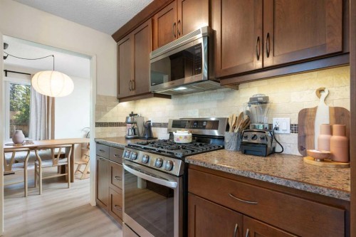 9308 26 Street Sw, Calgary, AB - Indoor Photo Showing Kitchen With Upgraded Kitchen