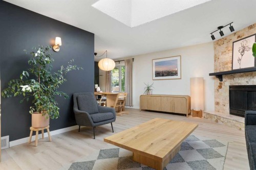 9308 26 Street Sw, Calgary, AB - Indoor With Fireplace