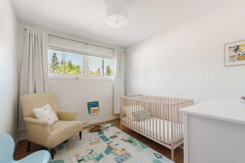 1571 Windsor Street Nw, Calgary, AB - Indoor Photo Showing Bedroom