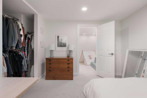 1571 Windsor Street Nw, Calgary, AB - Indoor Photo Showing Bedroom
