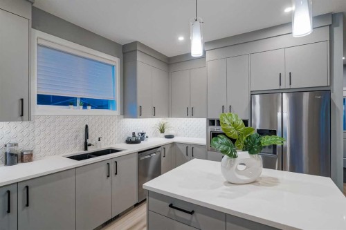 957 West Lakeview Drive, Chestermere, AB - Indoor Photo Showing Kitchen With Double Sink With Upgraded Kitchen