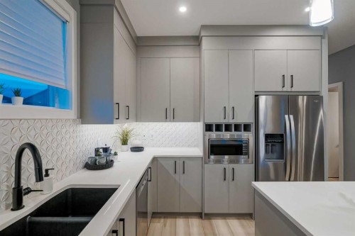 957 West Lakeview Drive, Chestermere, AB - Indoor Photo Showing Kitchen With Upgraded Kitchen