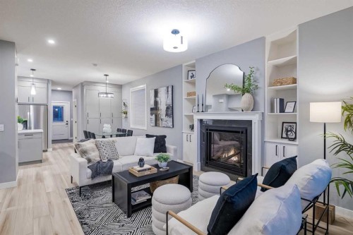 957 West Lakeview Drive, Chestermere, AB - Indoor Photo Showing Living Room With Fireplace