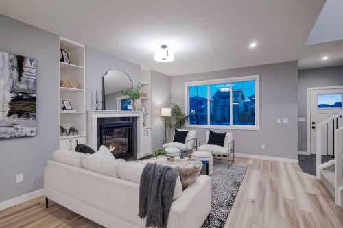 957 West Lakeview Drive, Chestermere, AB - Indoor Photo Showing Living Room With Fireplace