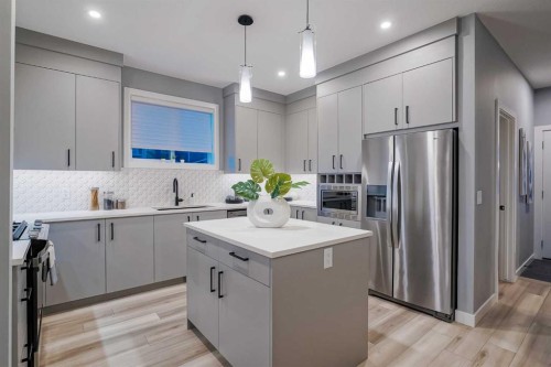 957 West Lakeview Drive, Chestermere, AB - Indoor Photo Showing Kitchen With Upgraded Kitchen
