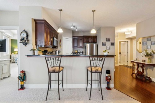 2308-2330 Fish Creek Boulevard Sw, Calgary, AB - Indoor Photo Showing Kitchen With Upgraded Kitchen
