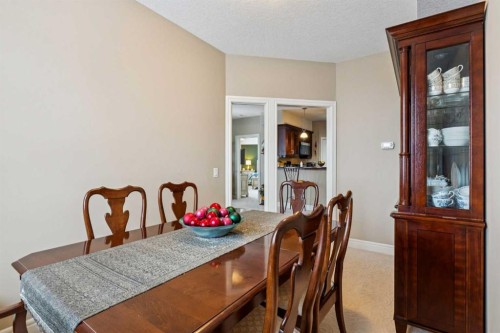 2308-2330 Fish Creek Boulevard Sw, Calgary, AB - Indoor Photo Showing Dining Room