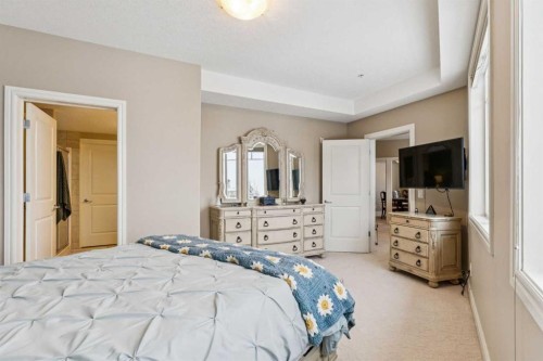 2308-2330 Fish Creek Boulevard Sw, Calgary, AB - Indoor Photo Showing Bedroom