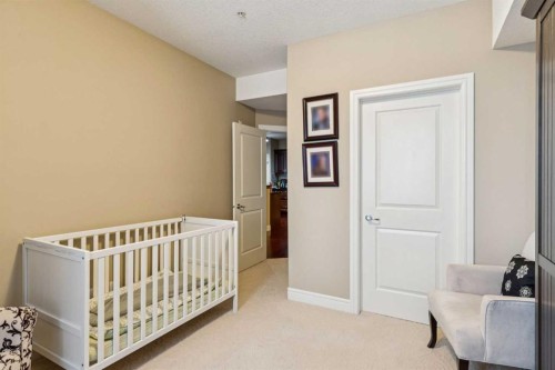 2308-2330 Fish Creek Boulevard Sw, Calgary, AB - Indoor Photo Showing Bedroom