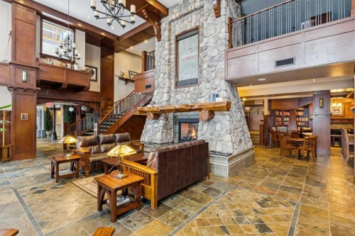 2308-2330 Fish Creek Boulevard Sw, Calgary, AB - Indoor With Fireplace