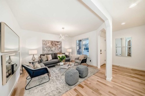 117 Chapalina Close Se, Calgary, AB - Indoor Photo Showing Living Room