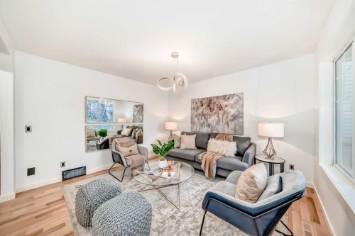 117 Chapalina Close Se, Calgary, AB - Indoor Photo Showing Living Room