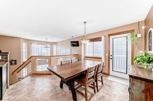 203 Hidden Spring Green Nw, Calgary, AB - Indoor Photo Showing Dining Room